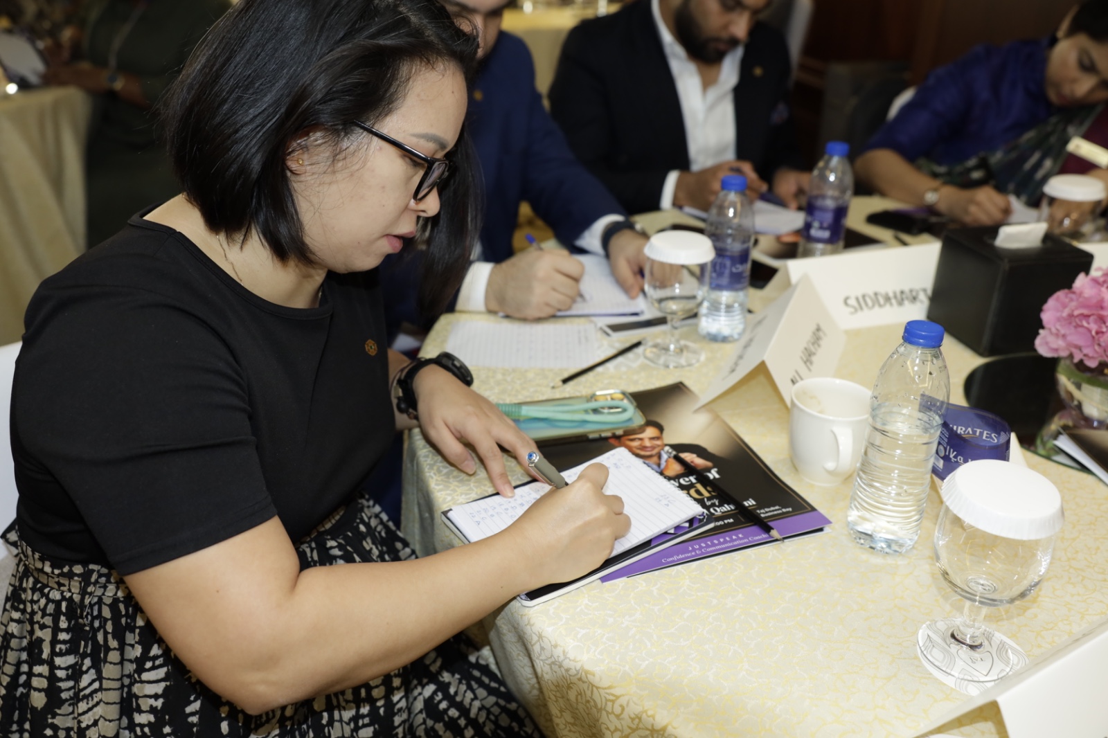 Participant taking notes during the masterclass