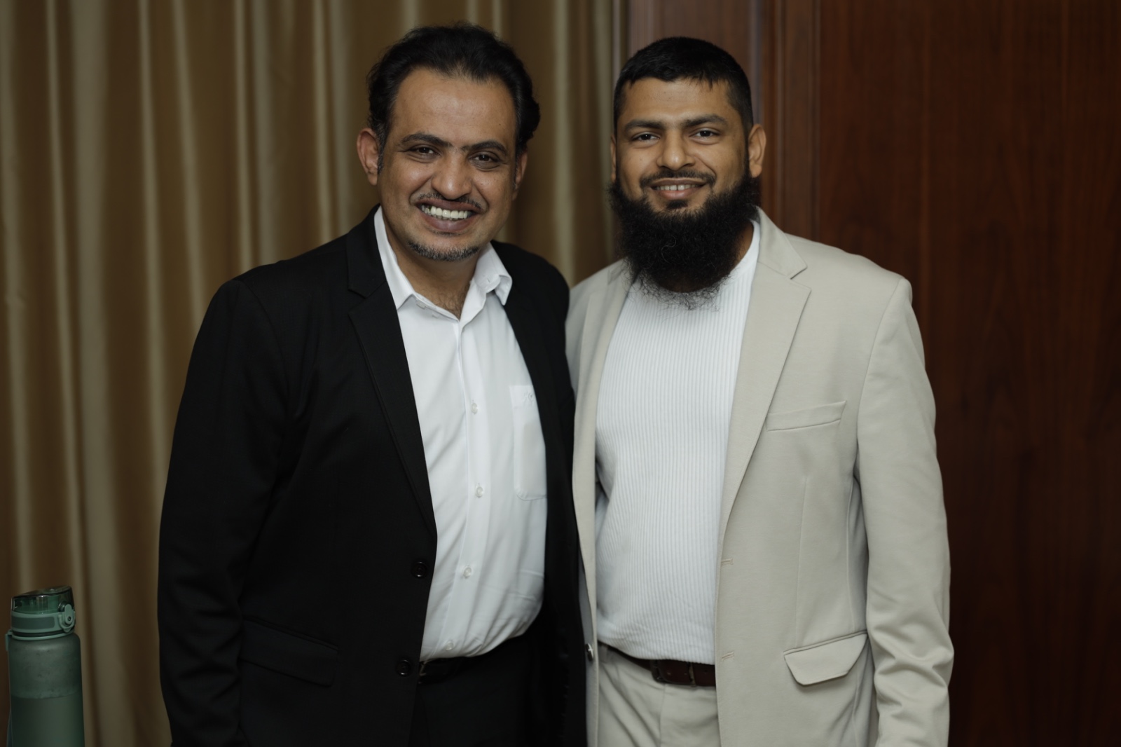 Mohammed Qahtani with an attendee at the event