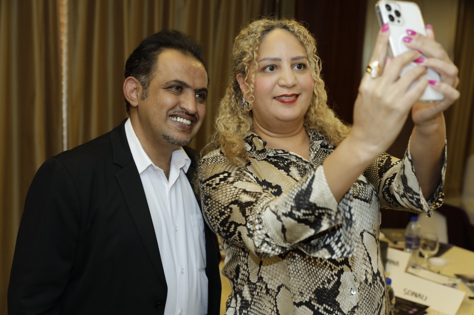 Attendee taking a selfie with Mohammed Qahtani at Taj Dubai