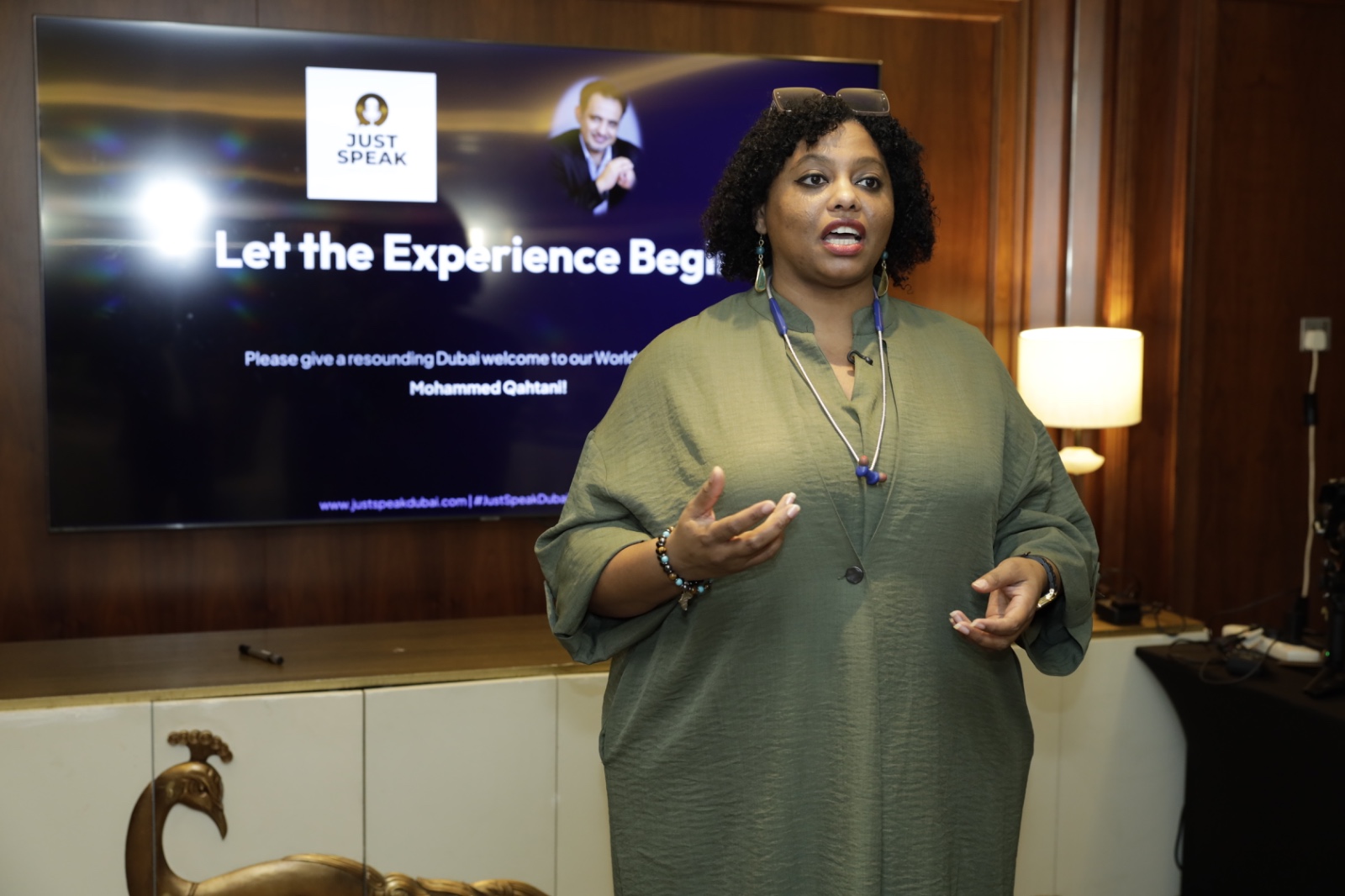 Host welcoming guests to The Power of Words in Dubai